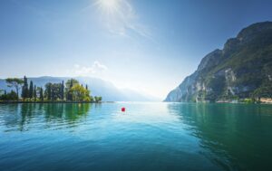 Riva del Garda gardens and trees on the lake. Italy