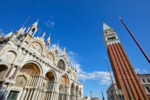 San Marco basilica facade and bell tower in Venice, Italy