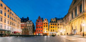 Stockholm, Sweden. Famous Old Colorful Houses, Swedish Academy and Nobel Museum In Old Square