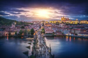 Aerial view of Charles Bridge at sunset with Prague Castle Skyline - Prague, Czech Republic