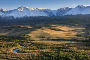 Autumn in Altai mountains. Chuya river, Kurai steppe and mountain range at sunset. Siberia, Russia