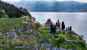 Beautiful view of the lake and the Church of Saint John the Theologian. Ohrid, North Macedonia.