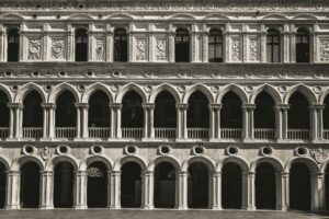 Columns with arches at Palazzo Ducale or Doge's Palace in Venice, Italy