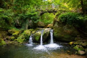 Fairytale rocky landscape with waterfall the schiessentumpel and bridge