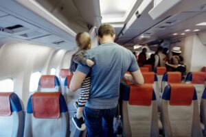 Father with child in airplane