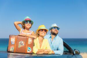 Happy family travel by car on summer vacation