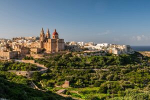 Il-Mellieha, Malta - Mellieha town at sunny day with Paris Church on hill top