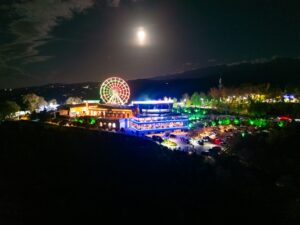 Kok-Tobe hill and amusement park in Almaty city at night