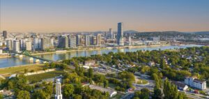 Panoramic night view of Belgrade Waterfront, Sava River, Belgrade Tower With Full Moon