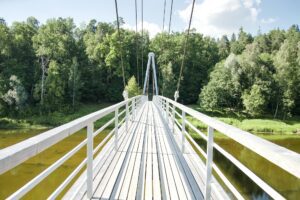 Pedestrian cable bridge over river Gauja in Sigulda, Latvia.