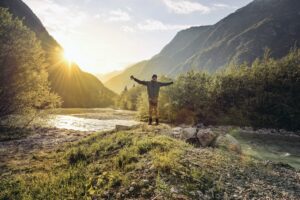 Slovenia, Bovec, man standing at Soca river