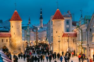 Tallinn, Estonia. People Walking Near Famous Landmark Viru Gate